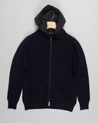 Gran Sasso Rain Wool zipped hoodie. Rain wool water-repellent treatment makes this garments water resistant. 
Body 100% wool, Hood 100% Nylon
Garment has been treated with TEFLON™ fabric protector applied by Zegna Baruffa Lane Borgosesia
Full Zip closure
Removable hood
Ribbed hem and cuffs
Article: 24117/24643
Colore: 598 / Navy
Made in Italy Gran Sasso Rain Wool Hoodie / Navy