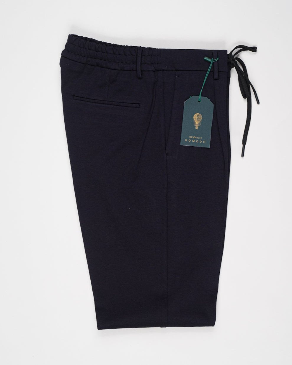 Model: Spiaggia 1p
Single pleat
Front pockets: slanted
Back pocket: welt (right side)
Color: Navy
Article: cn1217x
Composition: 70% Viscose 25% Polyamide 5% Elastan
Made in Martina Franca, Italy Berwich Drawstring Jersey Trousers / Navy