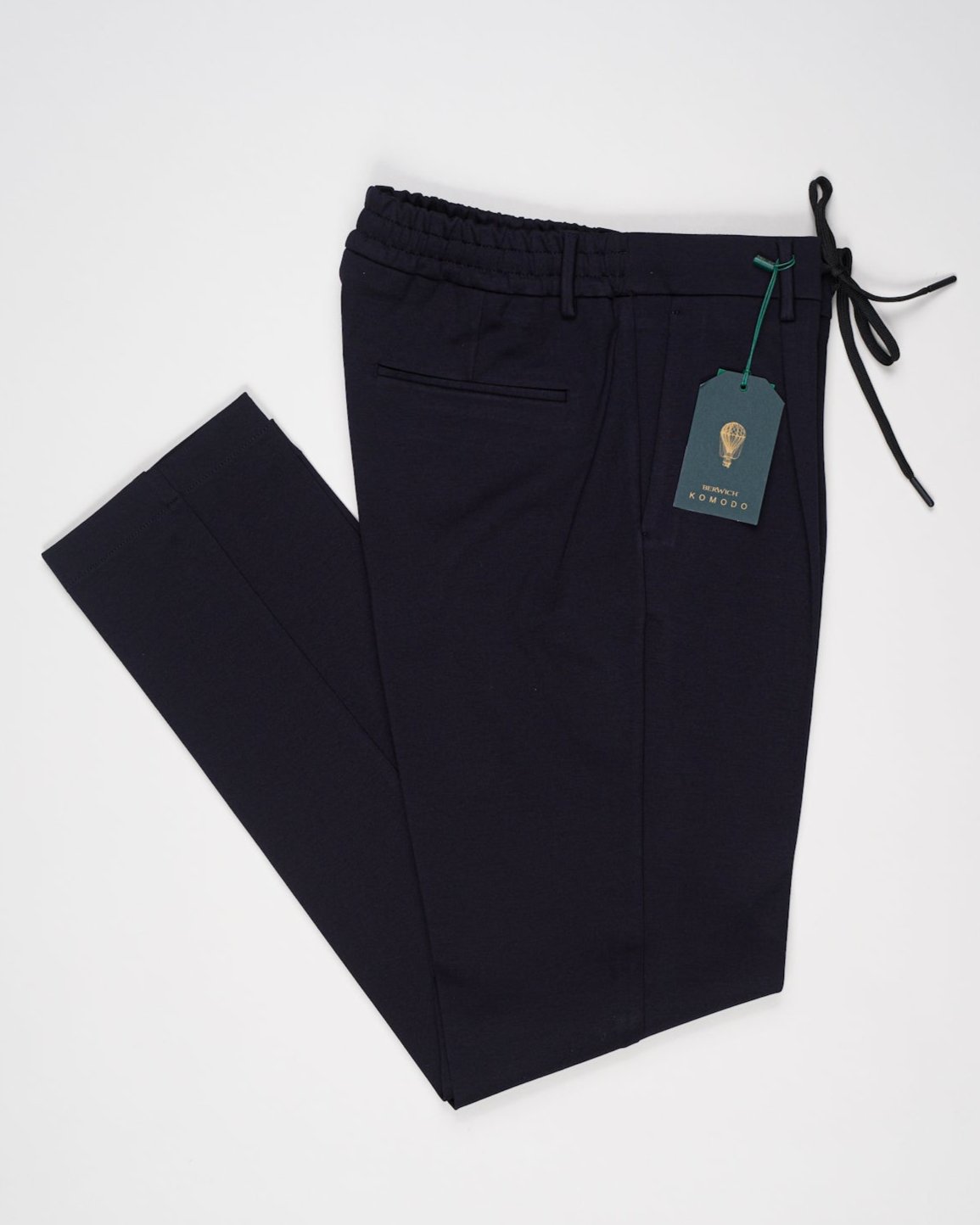 Model: Spiaggia 1p
Single pleat
Front pockets: slanted
Back pocket: welt (right side)
Color: Navy
Article: cn1217x
Composition: 70% Viscose 25% Polyamide 5% Elastan
Made in Martina Franca, Italy Berwich Drawstring Jersey Trousers / Navy