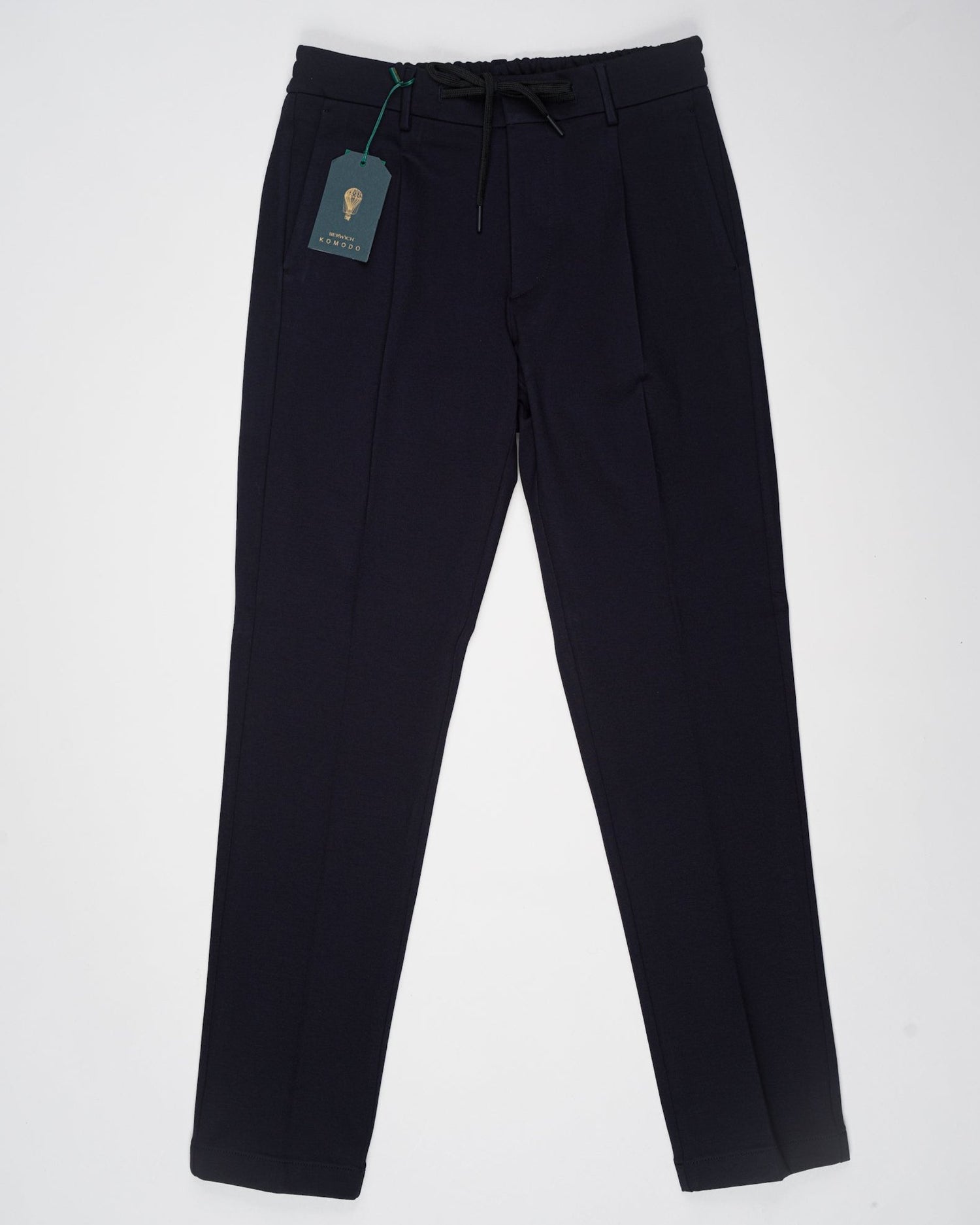 Model: Spiaggia 1p
Single pleat
Front pockets: slanted
Back pocket: welt (right side)
Color: Navy
Article: cn1217x
Composition: 70% Viscose 25% Polyamide 5% Elastan
Made in Martina Franca, Italy Berwich Drawstring Jersey Trousers / Navy
