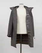 Article: 15CMOW255A 006355A Color: 670 / Olive Night External fabric: 100% Polyester Lining: 100% Polyamide / Nylon Padding (Feather): 90% White duck down, 10% Feather Adjustable hood with logo detail Hidden button and zip fastening Breathable armpit ventilation Taped shoulder seams Storm flap Internal pocket Angular hand pockets Adjustable waist and cuffs Logo detail