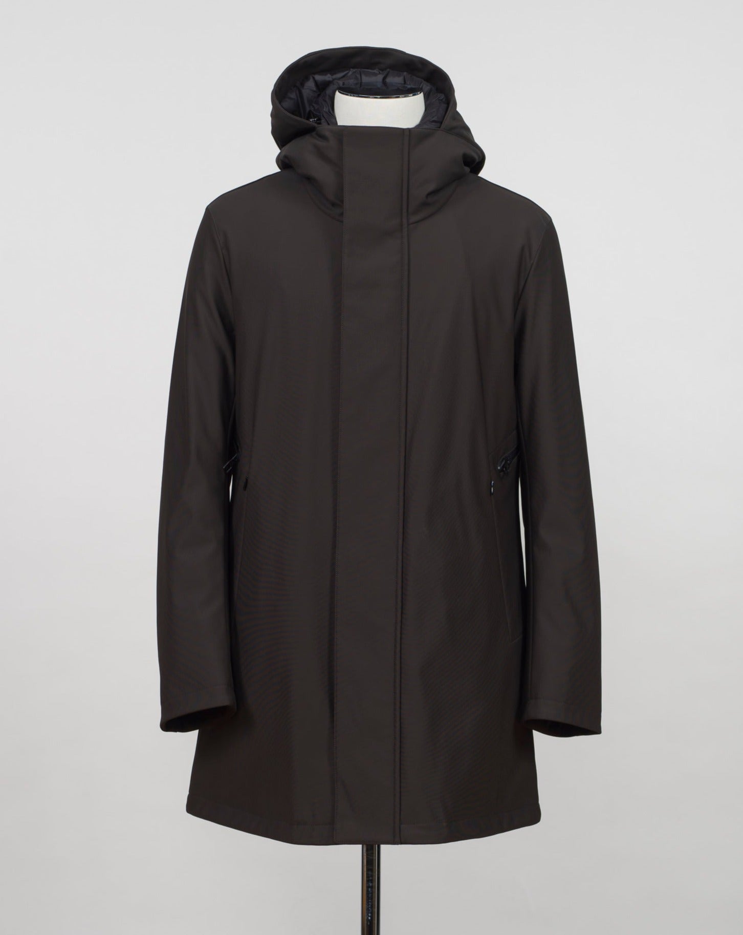 Montecore down insulated parka with technical external fabric. Waterproof, breathable, wind stoping. Model: F05MUCX512 Color: 31 / Dark Brown Fabric: 42% pl 36% pa 13% ea 9%pu Lining 100% pa (nylon) 4 zippered pockets in front 4 zippered inside pockets Adjustable hood Zip and snap fasteners closure in front