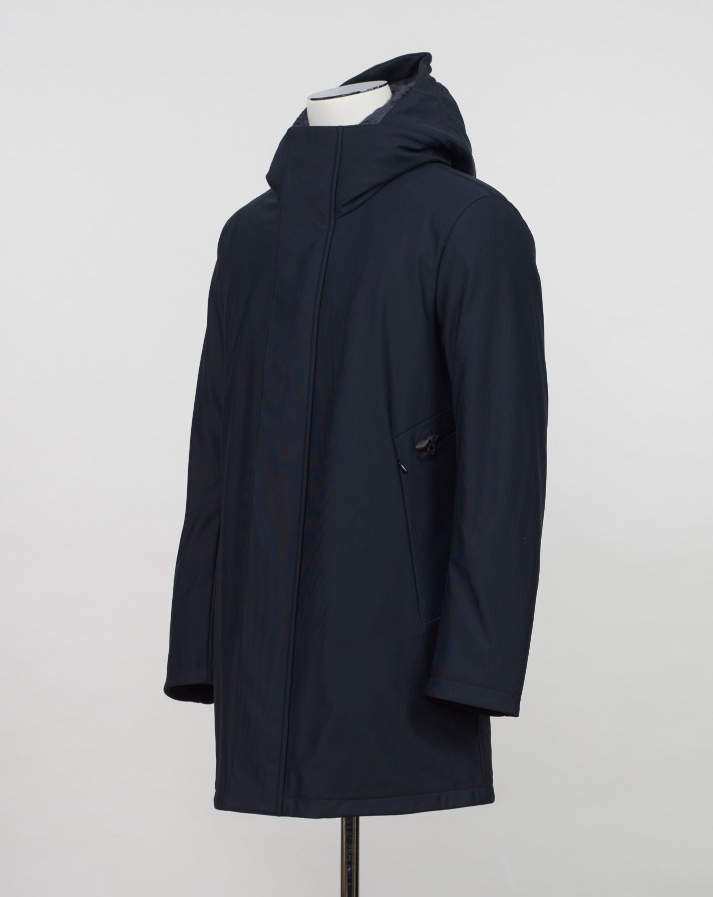 Montecore down insulated parka with technical external fabric. Waterproof, breathable, wind stoping. Model: F05MUCX512 Color: 89 / Navy Fabric: 42% pl 36% pa 13% ea 9%pu Lining 100% pa (nylon) 4 zippered pockets in front 4 zippered inside pockets Adjustable hood Zip and snap fasteners closure in front