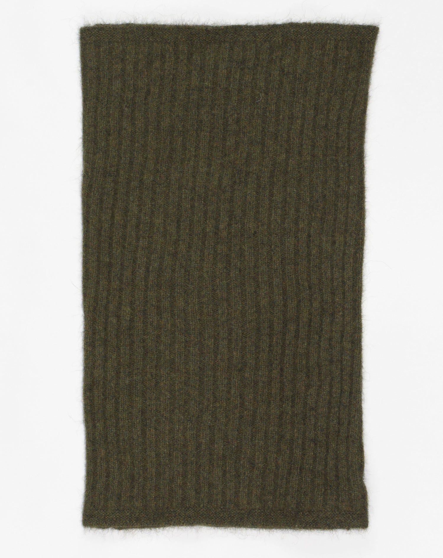Possum fur has very fine, hollow fibers, similar to polar bear. It is very warm, light weight and durable. Combined with merino wool and silk it makes a outstanding material for knitwear. Possum fibre for Sauso -products is sourced from New Zealand where possums are a pest doing harm to forests and birds. Mod. SISU Col. Avoka / Green Material: 40% possum, 53% merino wool, 7% sil