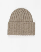 Possum fur has very fine, hollow fibers, similar to polar bear. It is very warm, light weight and durable. Combined with merino wool and silk it makes a outstanding material for knitwear. Possum fibre for Sauso -products is sourced from New Zealand where possums are a pest doing harm to forests and birds. Mod. Onni Col. Shale / Light gray Material: 40% possum, 53% merino wool, 7% silk