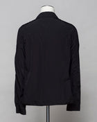 <ul> <li>Button fastening in front</li> <li>2 breast pockets with buttons</li> <li>Small pocket on left arm with snap fastener</li> <li>Embroidered tone-on-tone C.P. Company logo on left pocket</li> <li>Article: 16CMOS106A 005904G</li> <li>Composition: <span data-mce-fragment=