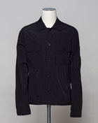 <ul> <li>Button fastening in front</li> <li>2 breast pockets with buttons</li> <li>Small pocket on left arm with snap fastener</li> <li>Embroidered tone-on-tone C.P. Company logo on left pocket</li> <li>Article: 16CMOS106A 005904G</li> <li>Composition: <span data-mce-fragment=