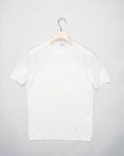 Indulge in luxury with Gran Sasso Knitted Linen T-Shirt. Made from high-quality knitted linen, this t-shirt offers a comfortable yet sophisticated fit. The perfect addition to your wardrobe for a touch of elegance and style.<ul> <li>Composition: 100% Linen</li> <li>Color: 005 / White</li> <li>Article: 57177 / 24801</li> <li>Made in Italy</li> </ul>
