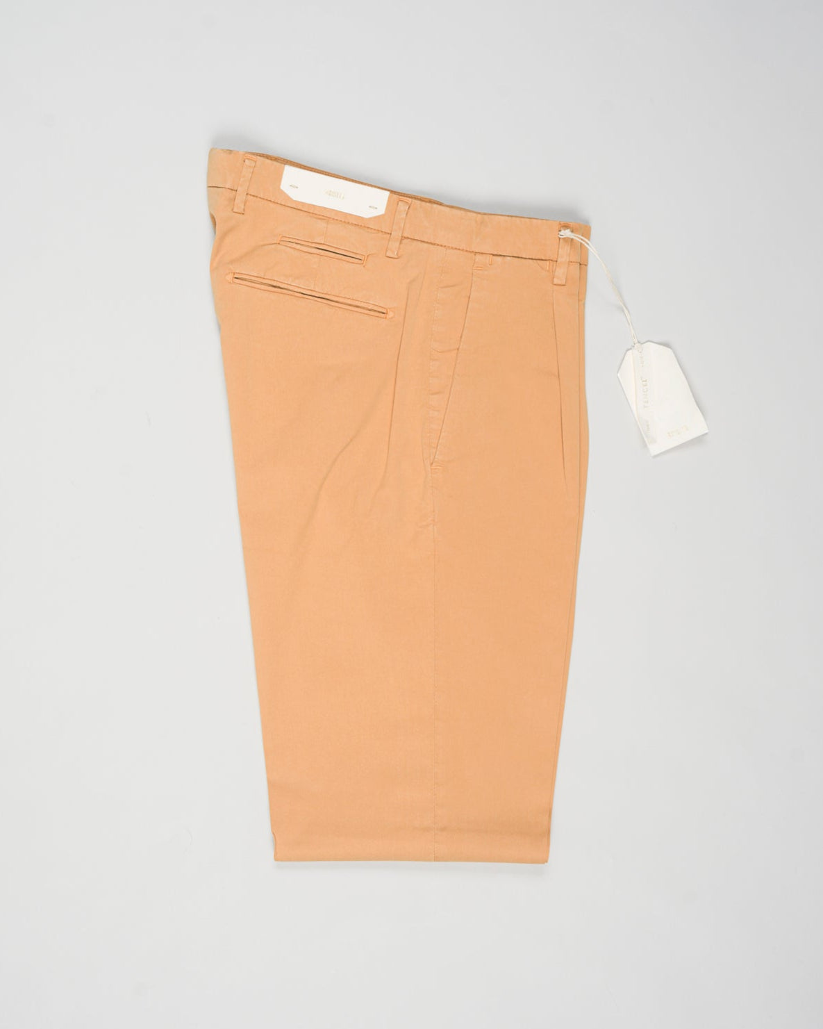 Article: 325051
Color: Mandarin / 34
Composition: 64% Tencel 32% Cotton 4% Elastan
Model: BG07
One pleat
Slanted side pockets
Beltloops
Beautiful color and broken in look and feel achieved by Garment dying process
Slim fit
1/2 hem 17 cm (Size 50)
Made in Naples, Italy