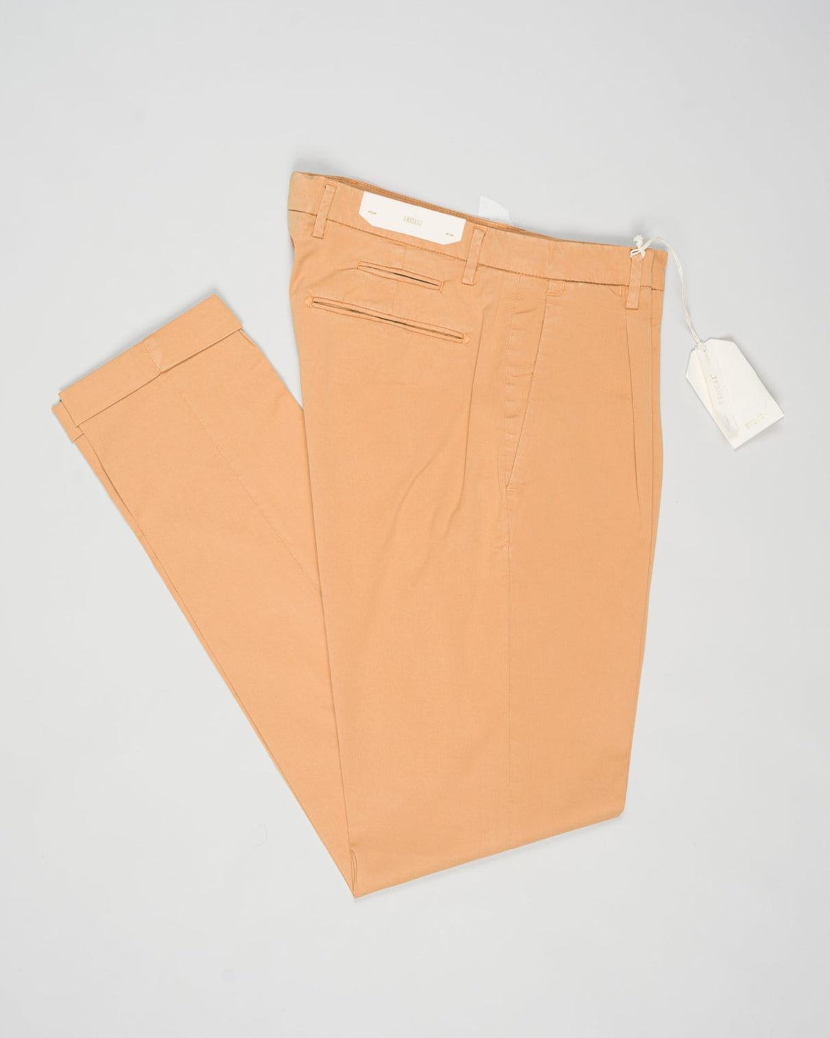 Article: 325051
Color: Mandarin / 34
Composition: 64% Tencel 32% Cotton 4% Elastan
Model: BG07
One pleat
Slanted side pockets
Beltloops
Beautiful color and broken in look and feel achieved by Garment dying process
Slim fit
1/2 hem 17 cm (Size 50)
Made in Naples, Italy