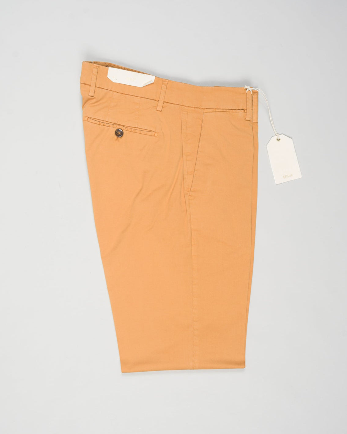Article: 325008
Color: Mandarin / 34
Composition: 98% Cotton 2% Elastan
Model: Soho
Flat front
Slanted side pockets
Beltloops
Beautiful color and broken in look and feel achieved by Garment dying process
Regular fit
1/2 hem 19.5 cm (Size 50)
Made in Naples, Italy