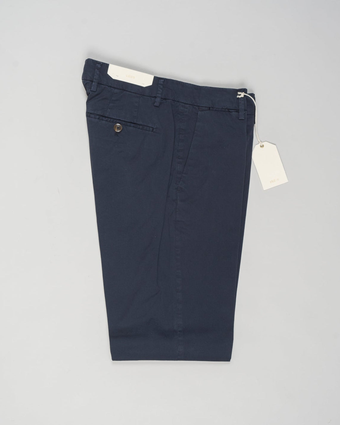 Article: 325008
Color: Navy / 11
Composition: 98% Cotton 2% Elastan
Model: Soho
Flat front
Slanted side pockets
Beltloops
Beautiful color and broken in look and feel achieved by Garment dying process
Regular fit
1/2 hem 19.5 cm (Size 50)
Made in Naples, Italy
