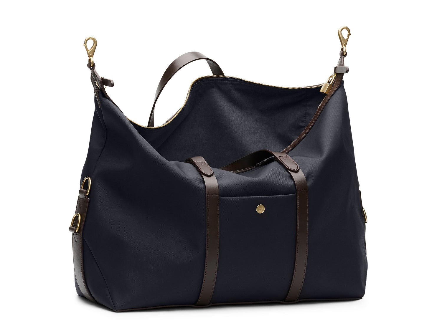 Measurements: L: 47 H: 29 W: 24cm Body: Hard-woven nylon (waterproof) Fabric composition: PA 42% CO 38% PU 20% / 826 gr./rm Trimmings: Dark brown custom developed vegetable tanned full-grain bridle leather Lining: 100% cotton in army colour Hardware: Solid brass with varnish protection Zipper: Hand polished YKK Excella Art. No. MS861319 Built for the travelling cosmopolitan, the M/S Avail is our latest take on a weekender that seamlessly merges style and function in a compact shape with enough room