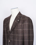 Regular fit Fits true to the size. If in doubt of your size, please contact us HERE Unlined Unconstructed shoulder 2 Buttons Side vents Notch lapel Patch pockets Composition: 100% wool Color: Brown Modello: 2898 Article: 02193/1 Made in Italy unlined structure. Earthy tones of this jacket makes it pleasant to combine with a lot of colors and textures. Absolutely gorgeous piece of garment for the autumn.