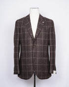 Regular fit Fits true to the size. If in doubt of your size, please contact us HERE Unlined Unconstructed shoulder 2 Buttons Side vents Notch lapel Patch pockets Composition: 100% wool Color: Brown Modello: 2898 Article: 02193/1 Made in Italy unlined structure. Earthy tones of this jacket makes it pleasant to combine with a lot of colors and textures. Absolutely gorgeous piece of garment for the autumn.