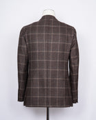 Regular fit Fits true to the size. If in doubt of your size, please contact us HERE Unlined Unconstructed shoulder 2 Buttons Side vents Notch lapel Patch pockets Composition: 100% wool Color: Brown Modello: 2898 Article: 02193/1 Made in Italy unlined structure. Earthy tones of this jacket makes it pleasant to combine with a lot of colors and textures. Absolutely gorgeous piece of garment for the autumn.