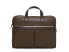 Measurements: L: 39 H: 29 W: 8cm Body: Tight-woven cotton canvas Fabric composition: CO 94% PU 4% PC 2% - 709 gr/rm Trimmings: Dark brown custom developed vegetable tanned full-grain bridle leather Lining: 100% cotton in army colour Hardware: Solid brass with varnish protection Zipper: Hand polished YKK Excella Art. No. MS461315 A softer and more casual counterpart to the M/S Briefcase, the M/S Office is designed with dual front pockets that zip open into one large compartment.