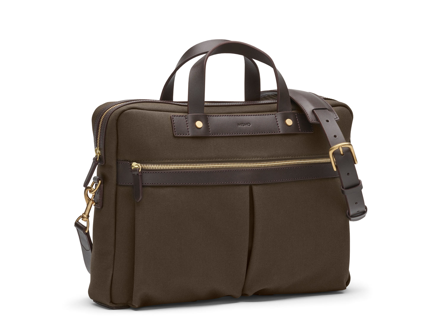 Measurements: L: 39 H: 29 W: 8cm Body: Tight-woven cotton canvas Fabric composition: CO 94% PU 4% PC 2% - 709 gr/rm Trimmings: Dark brown custom developed vegetable tanned full-grain bridle leather Lining: 100% cotton in army colour Hardware: Solid brass with varnish protection Zipper: Hand polished YKK Excella Art. No. MS461315 A softer and more casual counterpart to the M/S Briefcase, the M/S Office is designed with dual front pockets that zip open into one large compartment.