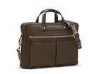 Measurements: L: 39 H: 29 W: 8cm Body: Tight-woven cotton canvas Fabric composition: CO 94% PU 4% PC 2% - 709 gr/rm Trimmings: Dark brown custom developed vegetable tanned full-grain bridle leather Lining: 100% cotton in army colour Hardware: Solid brass with varnish protection Zipper: Hand polished YKK Excella Art. No. MS461315 A softer and more casual counterpart to the M/S Briefcase, the M/S Office is designed with dual front pockets that zip open into one large compartment.