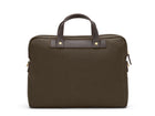 Measurements: L: 39 H: 29 W: 8cm Body: Tight-woven cotton canvas Fabric composition: CO 94% PU 4% PC 2% - 709 gr/rm Trimmings: Dark brown custom developed vegetable tanned full-grain bridle leather Lining: 100% cotton in army colour Hardware: Solid brass with varnish protection Zipper: Hand polished YKK Excella Art. No. MS461315 A softer and more casual counterpart to the M/S Briefcase, the M/S Office is designed with dual front pockets that zip open into one large compartment.
