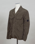 CP Blazer Nycra R MBZ250A00 5864G 683 Ivy Green 2 way zip + press studs in front 4 pockets in front with snap stud fastening Zippered pocket on left sleeve with C.P. Lens detailing Garment Dyed Quick Dry Stretch Multi filament