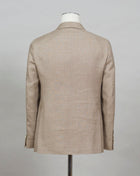 Caruso blazer impeccably tailored in Soragna, Parma, Italy. Stunning lightness and ease of movement without losing the classic tailored elegance. These are some of the ingredients that make Italian tailoring world famous and you can find it all in Caruso garments.  Beautiful handmade detailing and naturally with a full canvas structure inside.  CARUSO Blazer Model Tosca Art. 501426 BF2CM304A 58% Linen 42% Wool 2 Patch Pockets Side vents Half Lined Regular fit