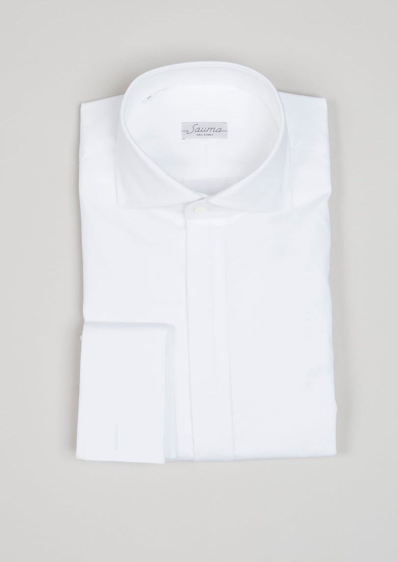 Sauma Private Label Festive Shirt in 100% cotton twill. This shirt can be used as a tuxedo shirt. This is our in-house quality and you can find it always in our collection.
100% cotton twill
Cutaway collar
Removable collar bones
Double cuffs
Hidden buttons in front