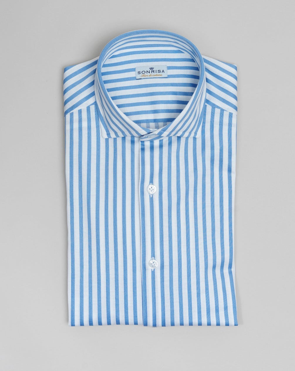 Jersey shirts are very comfortable and this shirt makes no exemption. It looks like dress shirt and feels like knitwear. We think this kind of garments represent modern tailoring very well. They honor classic styles and lines, but they are made to be super comfortable and practical. 100% Cotton Col. 01 / White & Light Blue Made in Italy