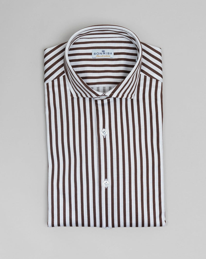 Jersey shirts are very comfortable and this shirt makes no exemption. It looks like dress shirt and feels like knitwear. We think this kind of garments represent modern tailoring very well. They honor classic styles and lines, but they are made to be super comfortable and practical.  100% Cotton Col. 03 / White & Brown Made in Italy
