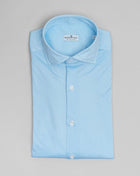 Jersey shirts are very comfortable and this shirt makes no exemption. It looks like dress shirt and feels like knitwear. We think this kind of garments represent modern tailoring very well. They honor classic styles and lines, but they are made to be super comfortable and practical. 100% Cotton Col. 01 / Light Blue Made in Italy