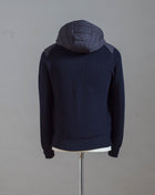 Gran Sasso Rain Wool zippered hoodie with nylon front. Rain wool water-repellent treatment makes this garments water repellent.   Fibres of the garment has been treated with TEFLON™ fabric protector applied by Zegna Baruffa Lane Borgosesia Full Zip closure Removable hood Ribbed hem and cuffs Article: 23177/24613 Colore: 598 / Dark Blue Made in Italy