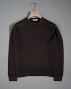 Gran Sasso Vintage merino wool knit. It has been garment dyed to achieve nice vintage look. This means it has more vivid compared to yarn dyed knitwear.   Vintage Merino is a core quality in our Gran Sasso collection. We offer a lighter quality for spring/summer and heavier for autumn/ winter season.   Crew neck 100% merino wool Vintage washed (garment dyed) Ribbed hem and cuffs Fashion fit Article: 55167/22792 Colore:   308 / Brown Made in Italy