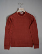 Gran Sasso Vintage merino wool knit. It has been garment dyed to achieve nice vintage look. This means it has more vivid compared to yarn dyed knitwear. Vintage Merino is a core quality in our Gran Sasso collection. We offer a lighter quality for spring/summer and heavier for autumn/ winter season. Crew neck 100% merino wool Vintage washed (garment dyed) Ribbed hem and cuffs Fashion fit Article: 55167/22792 Colore: 566 / Burned Orange Made in Italy