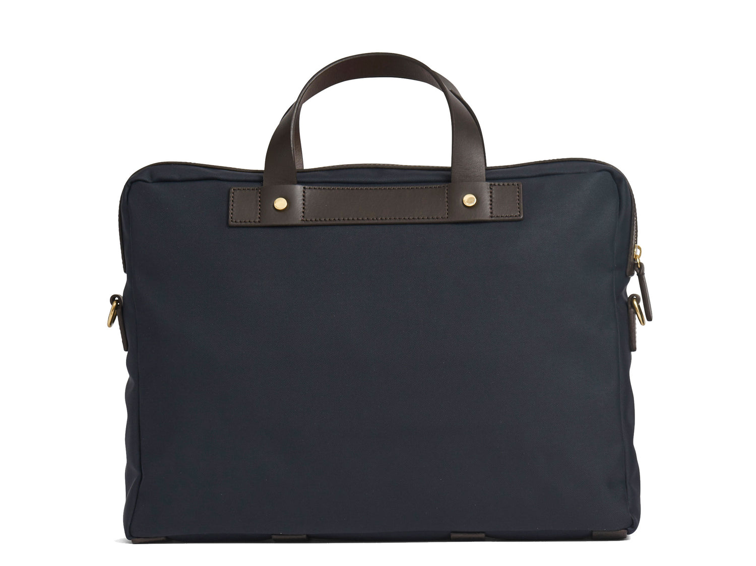 Measurements: L: 39 H: 29 W: 8cm Body: Waterproof hard woven Italian nylon Fabric composition: PA 42% CO 38% PU 20% / 826g pr/m Trimmings: Dark brown custom developed vegetable tanned full-grain bridle leather Lining: 100% cotton in navy colour Hardware: Solid brass with varnish protection Zipper: Hand polished YKK Excella Art. No. MS461315 A softer and more casual counterpart to the M/S Briefcase, the M/S Office is designed with dual front pockets that zip open into one large compartment
