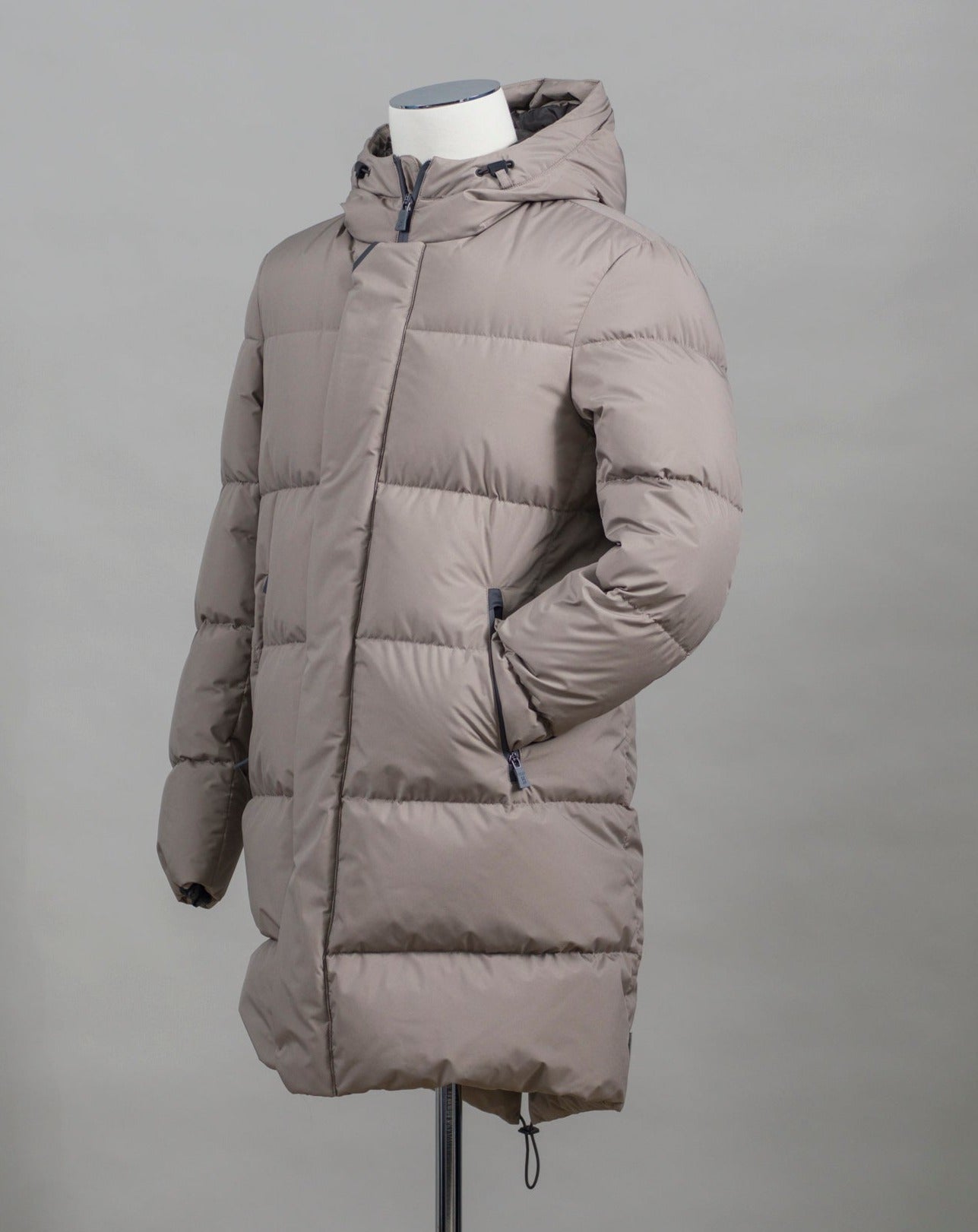 Herno Laminar Down Gore Windstopper Fishtail Parka. GORE TEX Infinium™ membrane makes this parka totally wind and water proof. Add puffy down filling and you do not have to worry about the winter conditions any more. Art. PI00245UL 11106 Col. 2600 / Taupe 80% Down 20% Feather Fixed hood Two way zipper in front