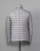 In-Tech™ Alternative Down Light insulation Water repellent Breathable External layer 100% Polyamide Internal padding 100% Polyester  Light insulation Buttons and Zip fastening in front Notch lapel Straight flap pockets Center vent PC002ULE 19288 Color: 1300 Made in Romania Herno In-Tech™ Alternative Down jacket. Very versatile outerwear piece that works just as good on both spring and fall or when ever it is a bit chilly.