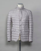 In-Tech™ Alternative Down Light insulation Water repellent Breathable External layer 100% Polyamide Internal padding 100% Polyester Light insulation Buttons and Zip fastening in front Notch lapel Straight flap pockets Center vent PC002ULE 19288 Color: 1300 Made in Romania Herno In-Tech™ Alternative Down jacket. Very versatile outerwear piece that works just as good on both spring and fall or when ever it is a bit chilly.