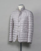 In-Tech™ Alternative Down Light insulation Water repellent Breathable External layer 100% Polyamide Internal padding 100% Polyester Light insulation Buttons and Zip fastening in front Notch lapel Straight flap pockets Center vent PC002ULE 19288 Color: 1300 Made in Romania Herno In-Tech™ Alternative Down jacket. Very versatile outerwear piece that works just as good on both spring and fall or when ever it is a bit chilly.