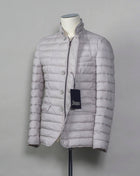 In-Tech™ Alternative Down Light insulation Water repellent Breathable External layer 100% Polyamide Internal padding 100% Polyester Light insulation Buttons and Zip fastening in front Notch lapel Straight flap pockets Center vent PC002ULE 19288 Color: 1300 Made in Romania Herno In-Tech™ Alternative Down jacket. Very versatile outerwear piece that works just as good on both spring and fall or when ever it is a bit chilly.