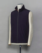 Montecore light down vest. Four zippered pockets outside and 2 inside. Light weight hood folded inside the collar. Article: S04MUWX725 Fabric: Solotex® 100% Polyester Lining: 100% Polyamide Filling: 90% Down 10% Feathers Color: 89 / Navy