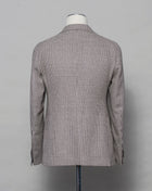 Tagliatore linen/cotton jersey blazer. Model Montecarlo, which is familiar to most of our regular customers. Slim fit with light unconstructed make. Comfortable to wear and easy to combine with almost anything. If in doubt of your size, please contact us HERE. Composition: 42% Linen 21% Silk 21% Wool 15% Cotton 1% Elastan Modello: Monte Carlo / 1SMC22K Color: Brown & Cream / T3143 Unconstructed Unlined 2 Buttons Notch lapel Patch pockets Side vents Made in Martina Franca, Italy