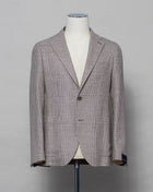 Tagliatore linen/cotton jersey blazer. Model Montecarlo, which is familiar to most of our regular customers. Slim fit with light unconstructed make. Comfortable to wear and easy to combine with almost anything. If in doubt of your size, please contact us HERE. Composition: 42% Linen 21% Silk 21% Wool 15% Cotton 1% Elastan Modello: Monte Carlo / 1SMC22K Color: Brown & Cream / T3143 Unconstructed Unlined 2 Buttons Notch lapel Patch pockets Side vents Made in Martina Franca, Italy