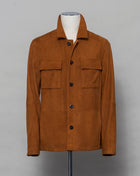 Light jacket made of soft goatskin suede and napped inside. Super soft leather make a truly luxurious interpretation of a field jacket. 100% goatskin suede, napped inside Body: unlined, sleeve lining: 100% polyamide Embossed logo Inside pockets Mod: 31 1006 ZN 737