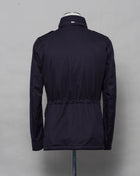 This Herno jacket honors the iconic M65 field jacket. Practical design with quite a few pockets, action back and adjustable waist. Why change the winning team.  4+2 pockets outside (2 hidden pockets) 2 pockets inside  Adjustable waist 2 way zip and snap buttons in front Hidden hood inside the collar  100% Cotton Washed effect  FI0064U 13211 9200