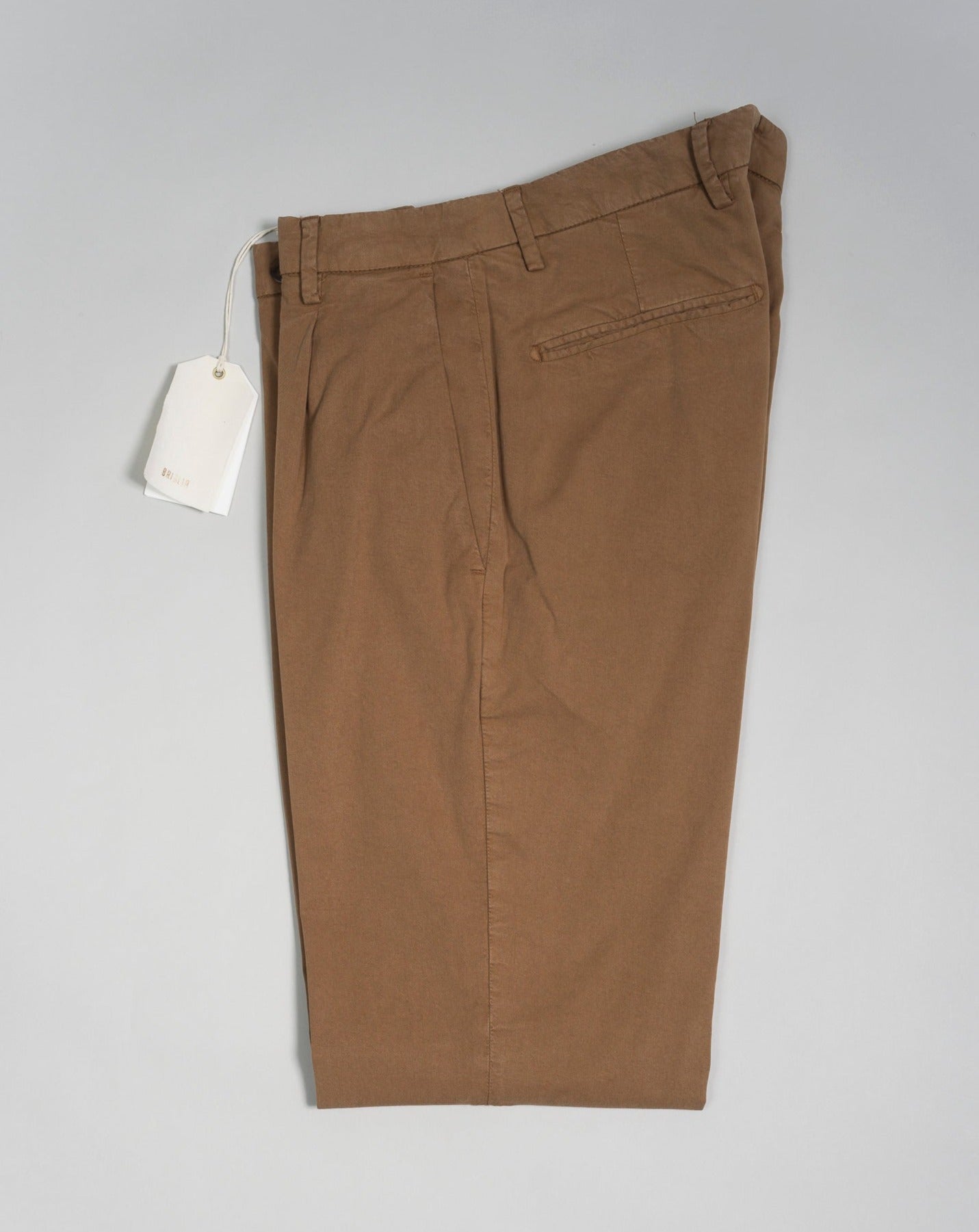 Article: 323051 Color: Tobacco / 93 Composition: 64% Tencel 32% Cotton 4% Elastan 1 Pleat in front Slanted side pockets Beltloops Beautiful color and broken in look and feel achieved by Garment dying process Made in Naples, Italy