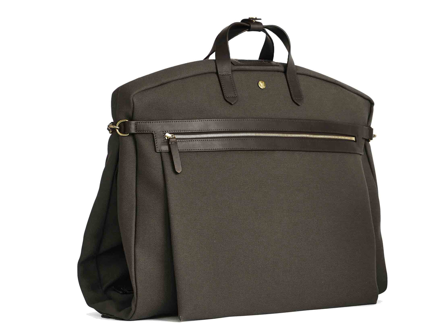 Measurements: L: 52 x W: 50 x H: 7 cm Body: Tight-woven cotton canvas Fabric composition: CO 94% PU 4% PC 2% / 709g /m Trimmings: Dark brown custom developed vegetable tanned full-grain bridle leather Lining: 100% cotton in army colour Hardware: Solid brass with varnish protection Zipper: Hand polished YKK Excella Art. No. MS440115 Transporting your work, wedding, and/or weekend wear just got a whole lot easier garments infirst full size garment bag large enough carry all