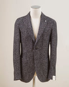 L.B.M. 1911 Jersey jacket.  Perfect jacket for almost any semiformal occasion in autumn and winter.   Regular fit Fits true to the size. If in doubt of your size, please contact us  here Unlined Unconstructed shoulder 2 Buttons Side vents Notch lapel Patch pockets Composition: 54% acrylic, 24% virgin wool, 22% polyester Color: Grey Modello: 2817 Article: 15203/3 Made in Italy