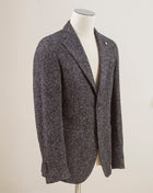 L.B.M. 1911 Jersey jacket.  Perfect jacket for almost any semiformal occasion in autumn and winter.   Regular fit Fits true to the size. If in doubt of your size, please contact us  here Unlined Unconstructed shoulder 2 Buttons Side vents Notch lapel Patch pockets Composition: 54% acrylic, 24% virgin wool, 22% polyester Color: Grey Modello: 2817 Article: 15203/3 Made in Italy
