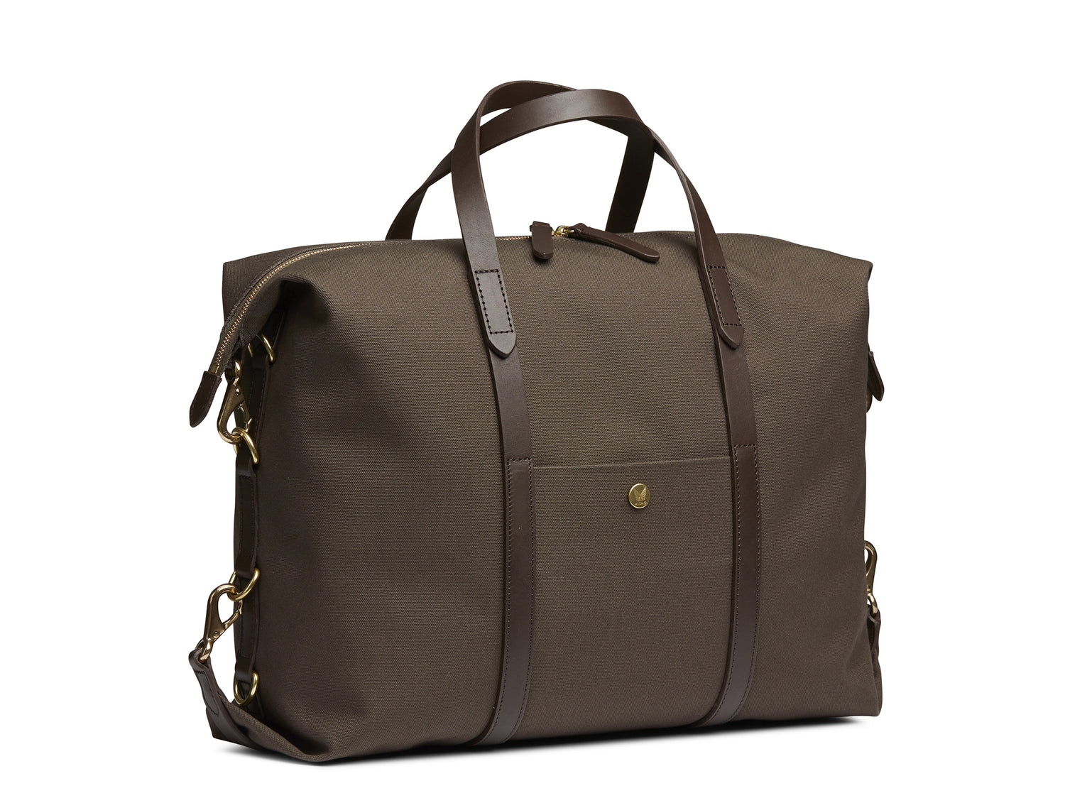 Measurements: L: 42(52) H: 31(41) W: 12(4) cm Body: Tight-woven cotton canvas Fabric composition: CO 94% PU 4% PC 2% - 709 gr/rm Trimmings: Dark brown custom developed vegetable tanned full-grain bridle leather Lining: 100% cotton in army colour Hardware: Solid brass with varnish protection Zipper: Hand polished YKK Excella Art. No. MS120110 A flexible duffle/work bag that can be adjusted in size by attaching the snap hooks in each corner of the bag to the brass D-rings on the gusset