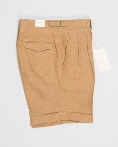 Article: 325117
Color: Brown / 36
Model: Amalfis
Composition: 100% Linen
Double pleats
Slanted side pockets
Side adjusters
Back pockets with flaps
Made in Naples, Italy
